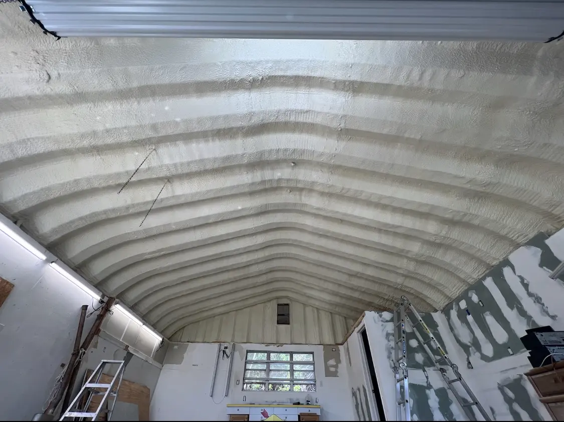 Spray polyurethane foam applied to the underside of a metal roof deck in Susquehanna